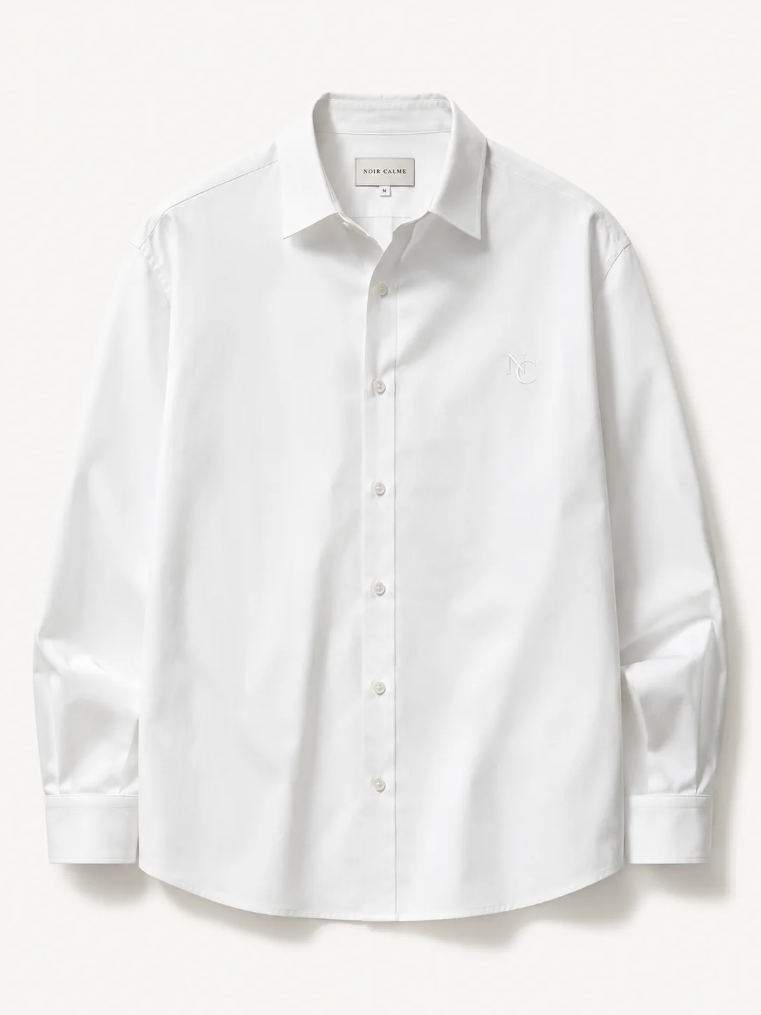 Oxford Shirt in off-white with a tonal NC monogram on the chest