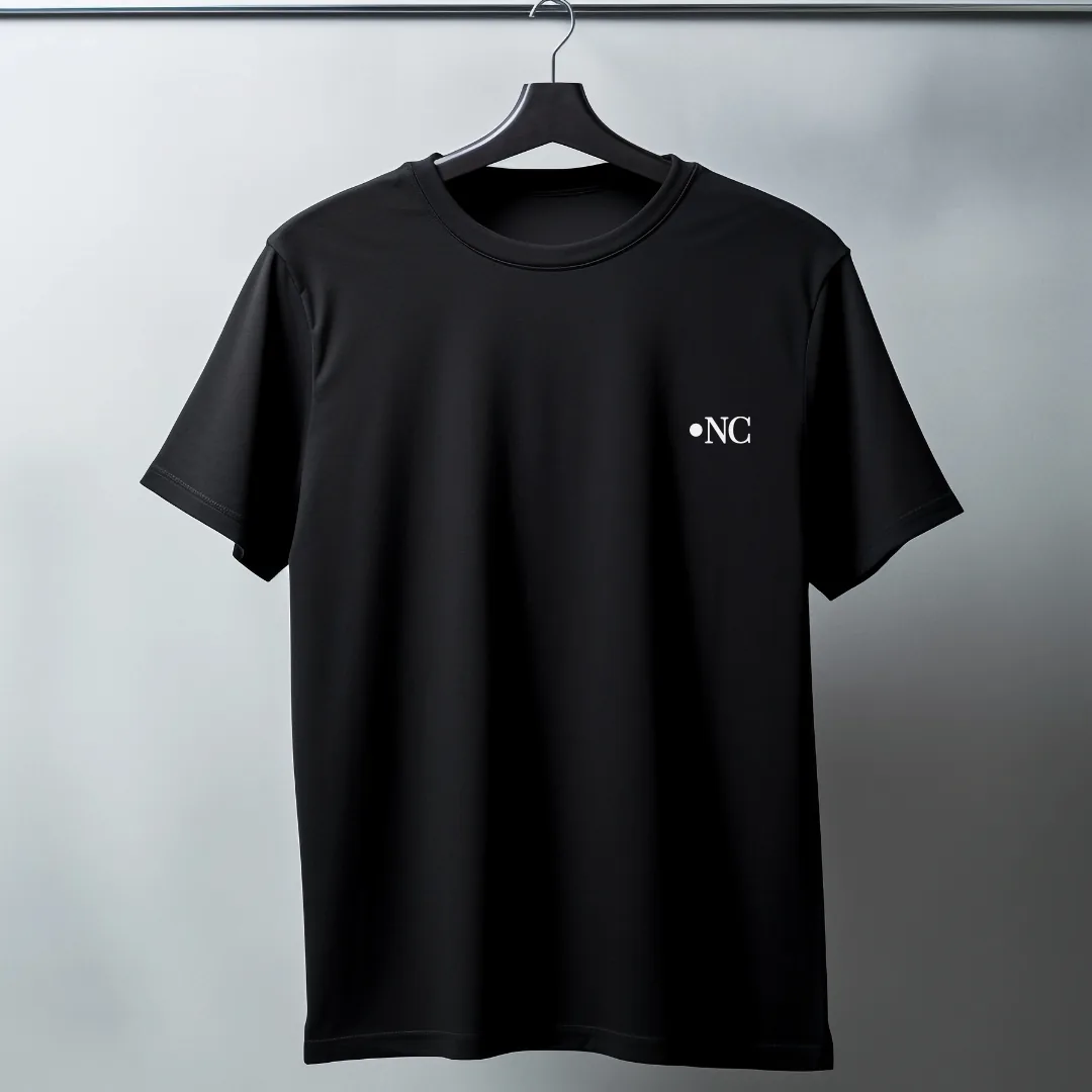 Signature Tee in black with the •NC monogram